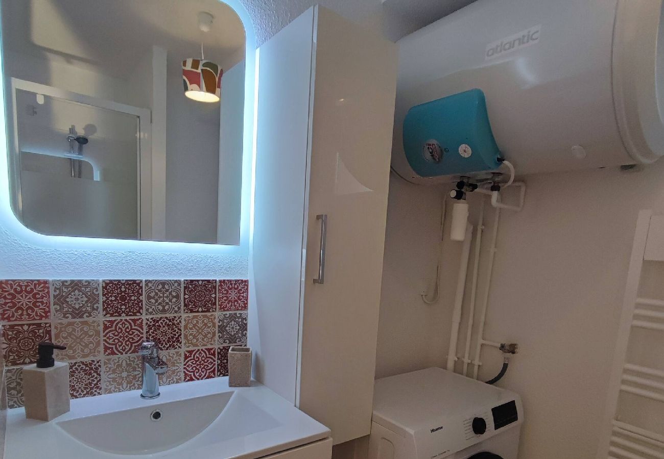 Shower room, vanity unit, washing machine