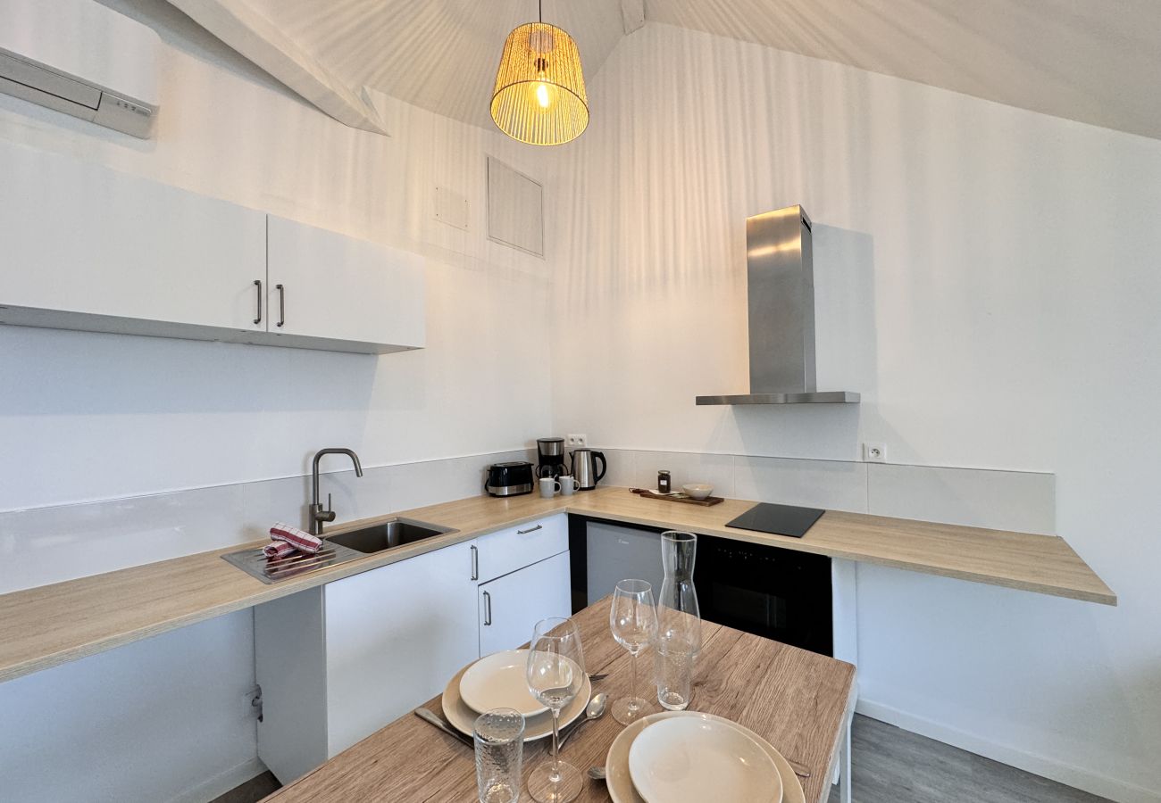 Dining area with crockery. 