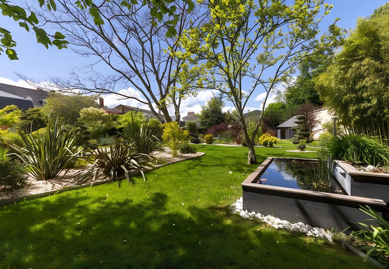 Garden with trees, fenced 