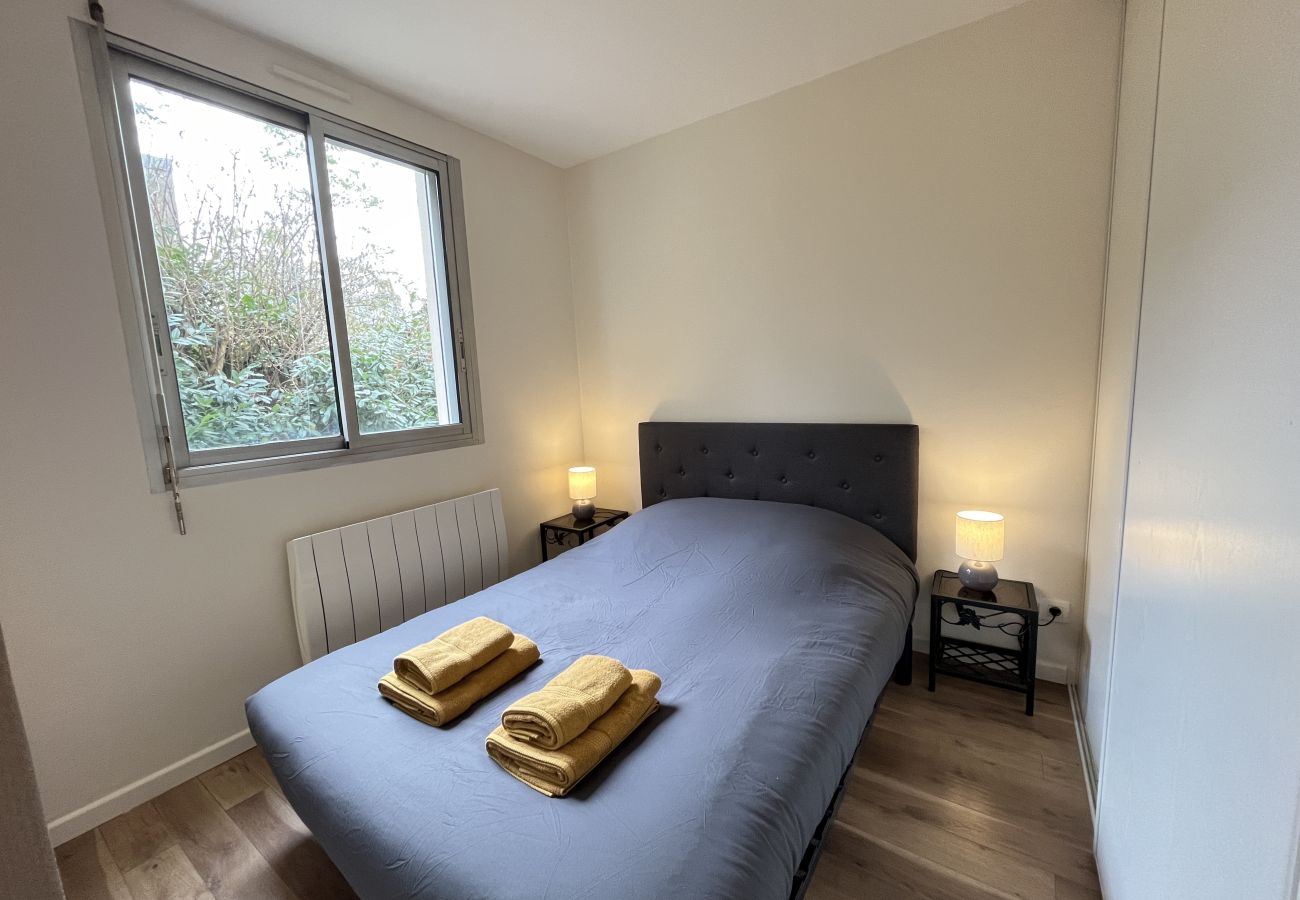 Bright bedroom with dressing room. 